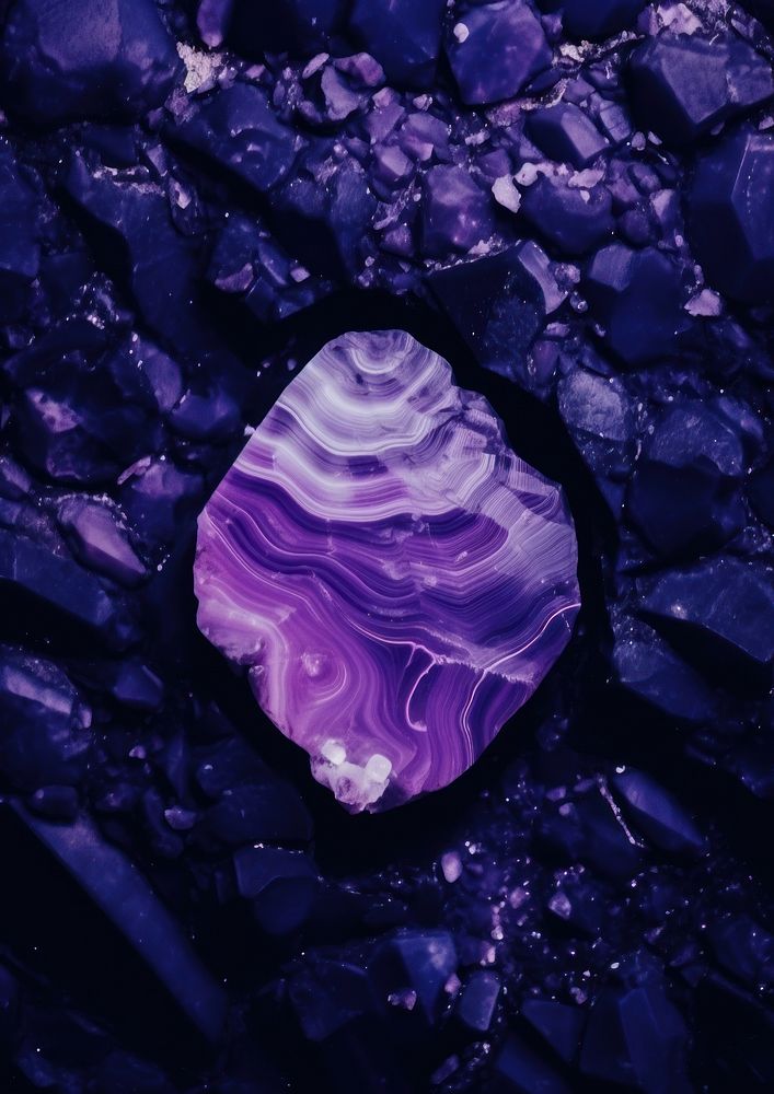 A purple gem-stone wallpaper backgrounds gemstone mineral. AI generated Image by rawpixel.