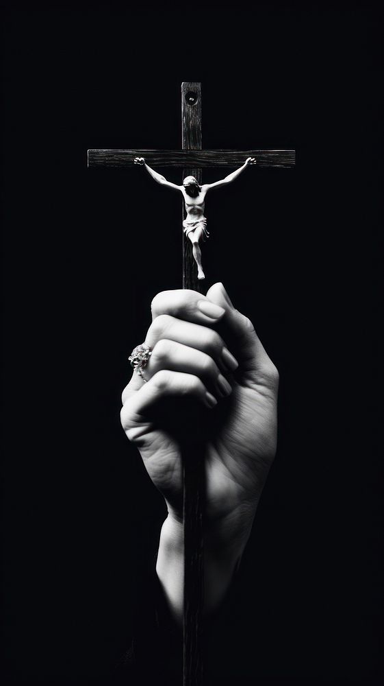 A hand holding a cross crucifix finger symbol. AI generated Image by rawpixel.