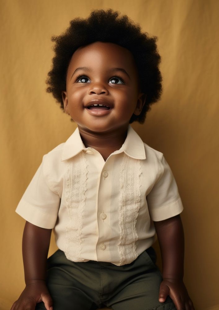 A little black boy baby photography portrait. AI generated Image by rawpixel.