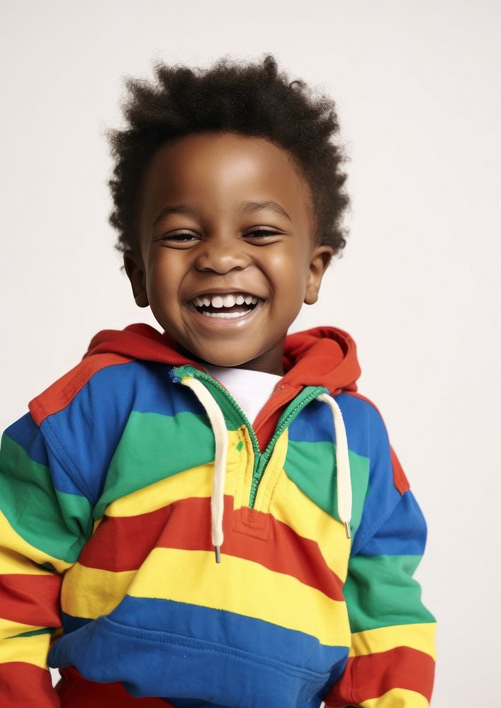 A little black boy in colorful outfit baby photography portrait. AI generated Image by rawpixel.