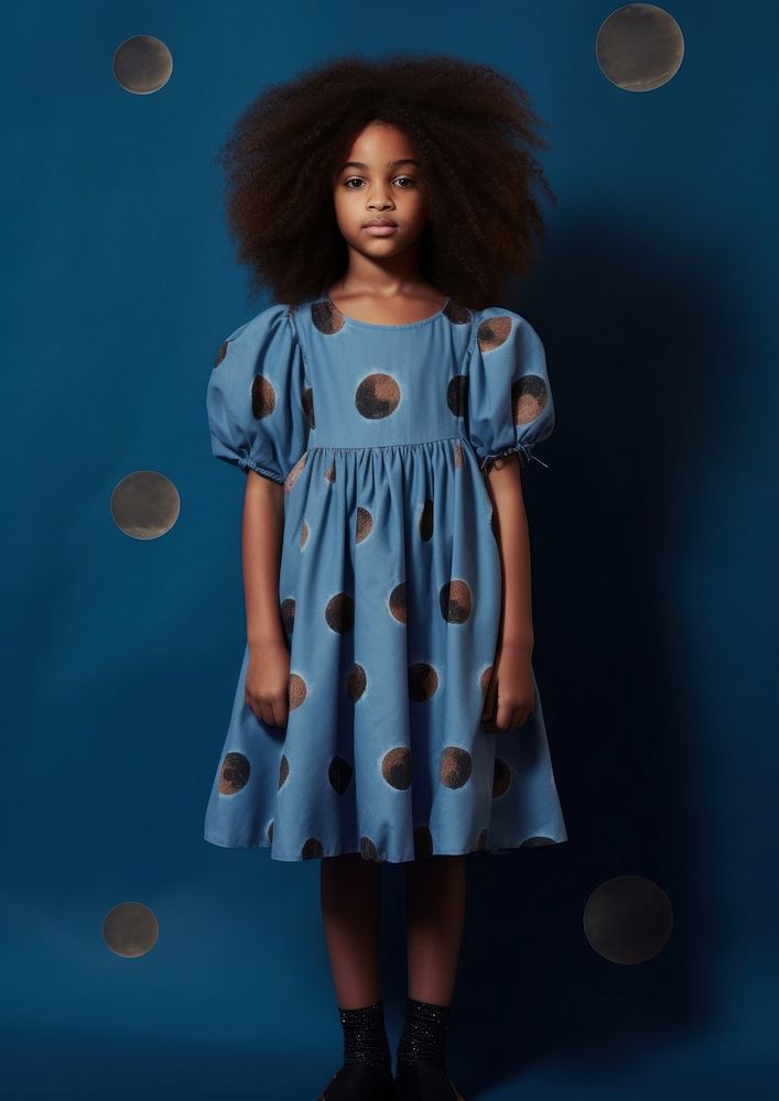 A little black girl wearing cute blue dress with moon pattern hairstyle innocence happiness. AI generated Image by rawpixel.