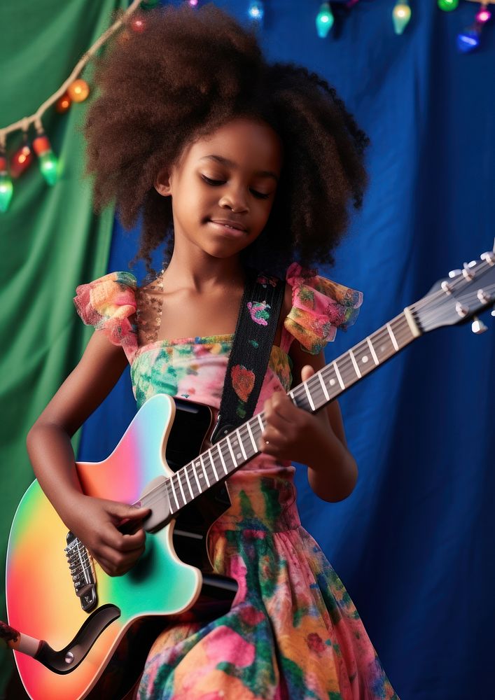 A little black girl wearing colorful dress and makeup playing guitar musician kid entertainment. AI generated Image by…
