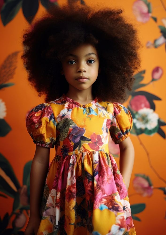 A little black girl wearing colorful flowers pattern dress photography portrait child. AI generated Image by rawpixel.