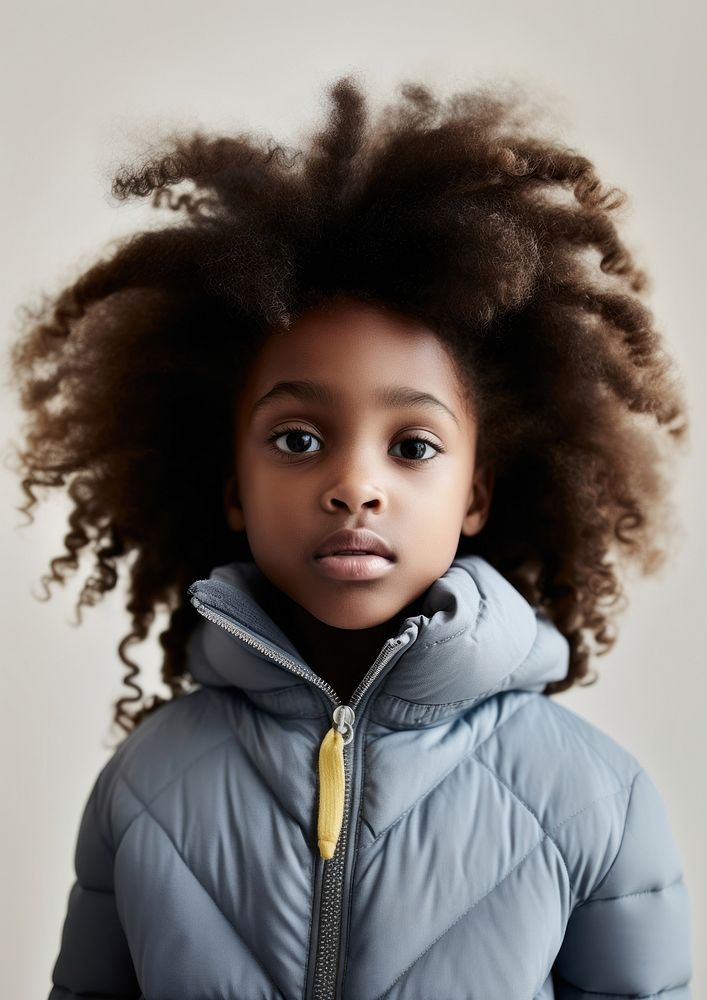 A little black girl portrait photography cute hairstyle. AI generated Image by rawpixel.