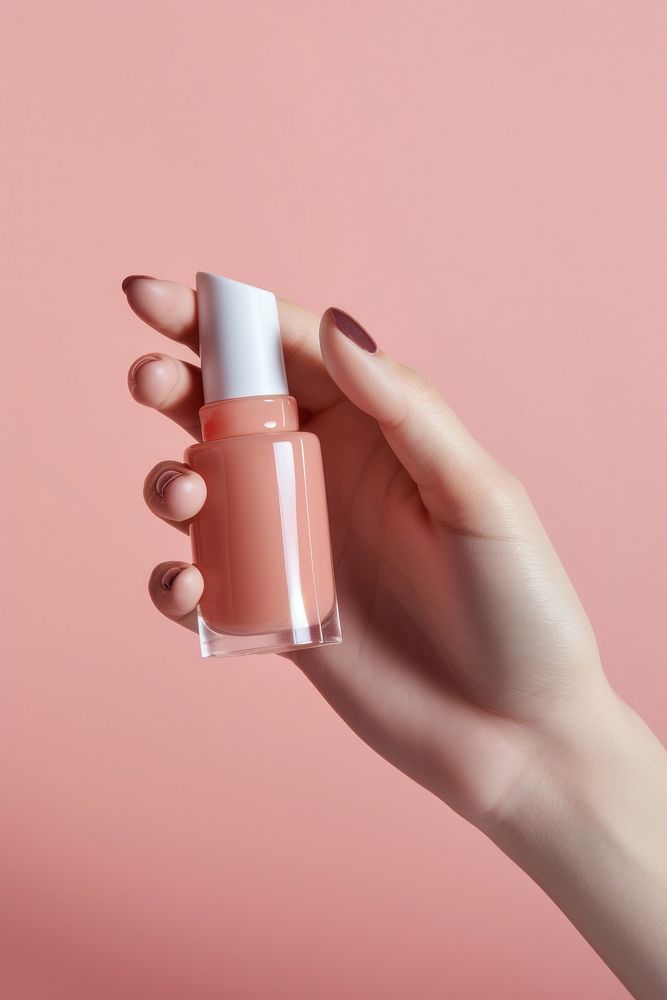 Liquid blush cosmetics holding hand. AI generated Image by rawpixel.