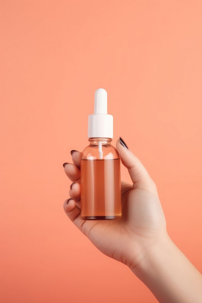 Skincare dropper bottle cosmetics holding hand. AI generated Image by rawpixel.