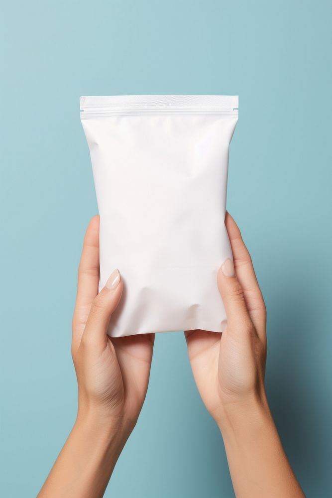Zip bag holding adult paper. AI generated Image by rawpixel.