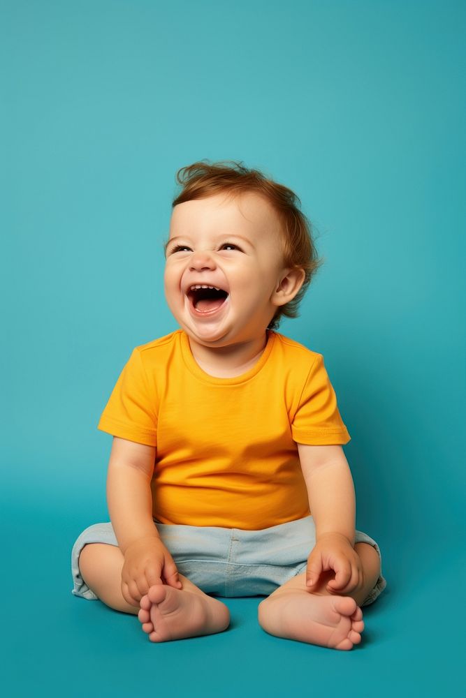 Baby sitting and laughing displeased relaxation happiness. AI generated Image by rawpixel.