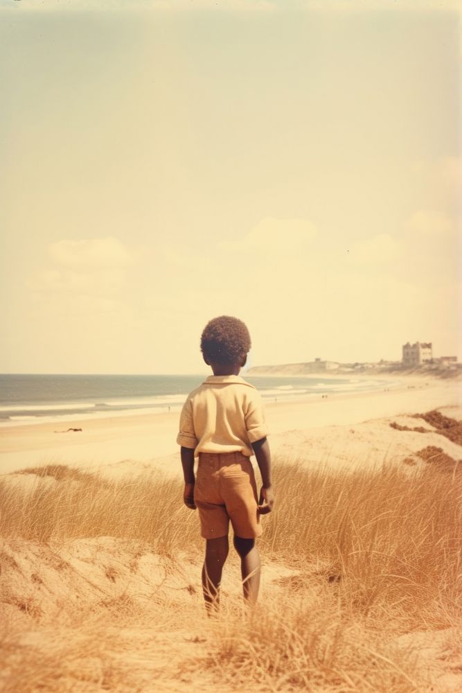 Kid on the beach standing outdoors portrait. AI generated Image by rawpixel.