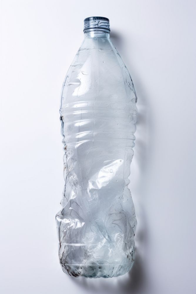 An empty crushed plastic bottle for recycle white background refreshment drinkware. AI generated Image by rawpixel.