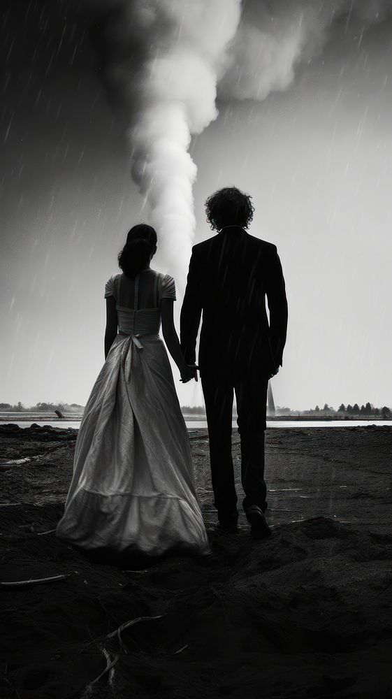 A wedding couple holding hand while the tornado at the background photography silhouette adult. AI generated Image by…