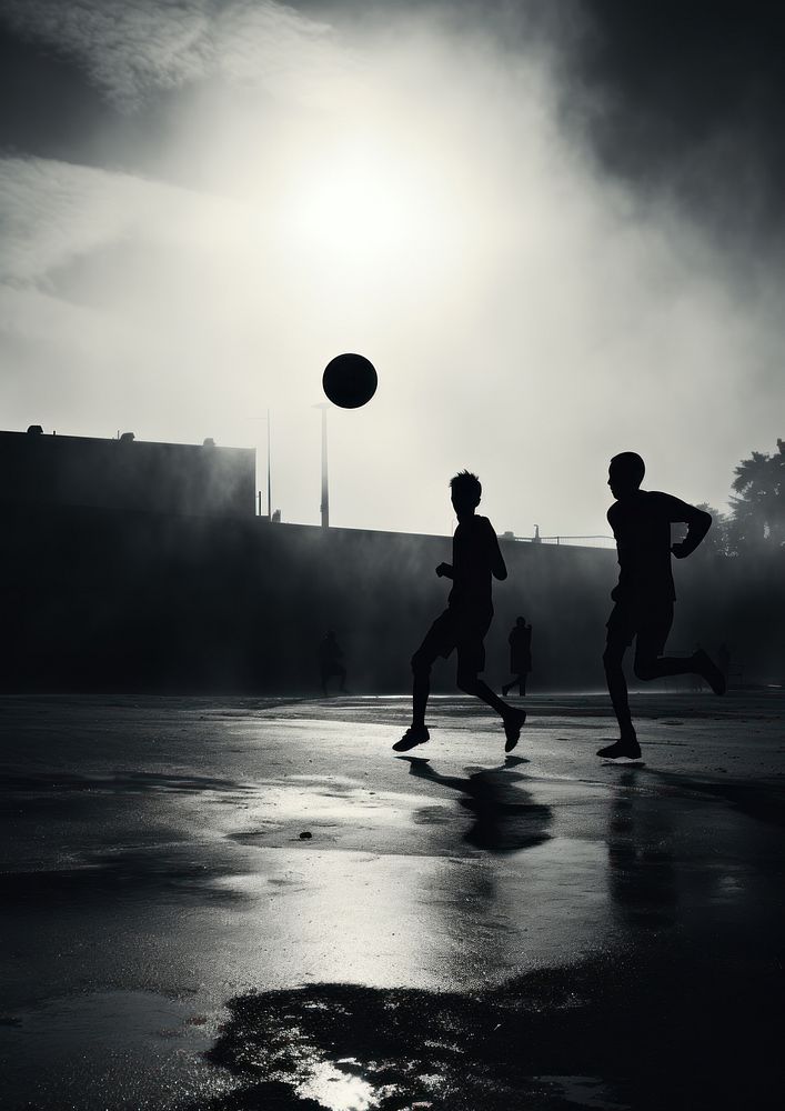 People playing soccer silhouette basketball motion. AI generated Image by rawpixel.