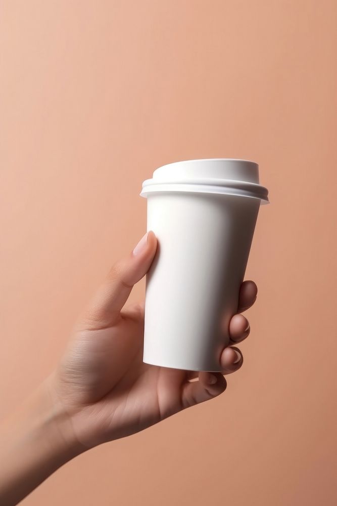 Cup holding coffee hand. AI generated Image by rawpixel.