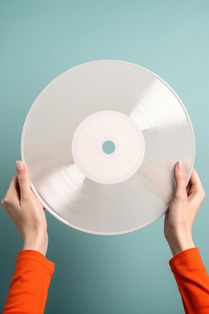 Vinyl record package holding hand technology. AI generated Image by rawpixel.