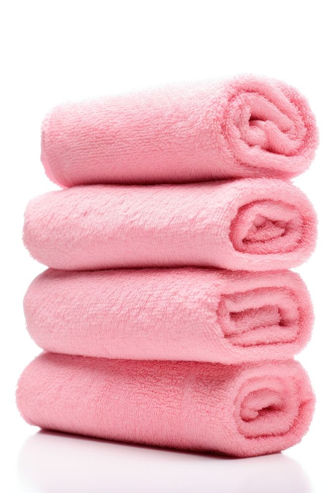 Rolled up towels pink white background softness. AI generated Image by rawpixel.