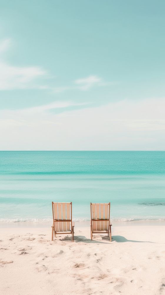 White beach and calm sea furniture outdoors vacation. AI generated Image by rawpixel.