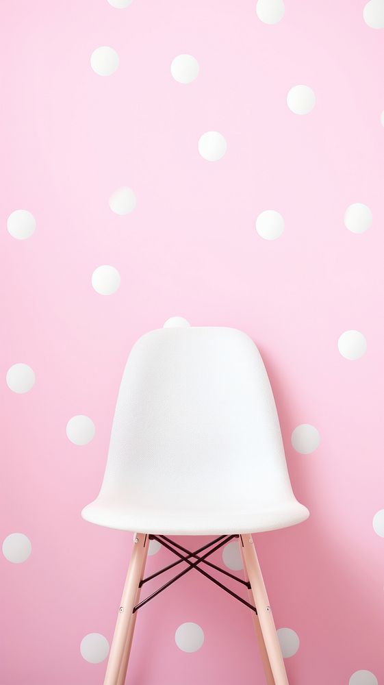 Pink pastel polka dot wallpaper pattern furniture chair. AI generated Image by rawpixel.