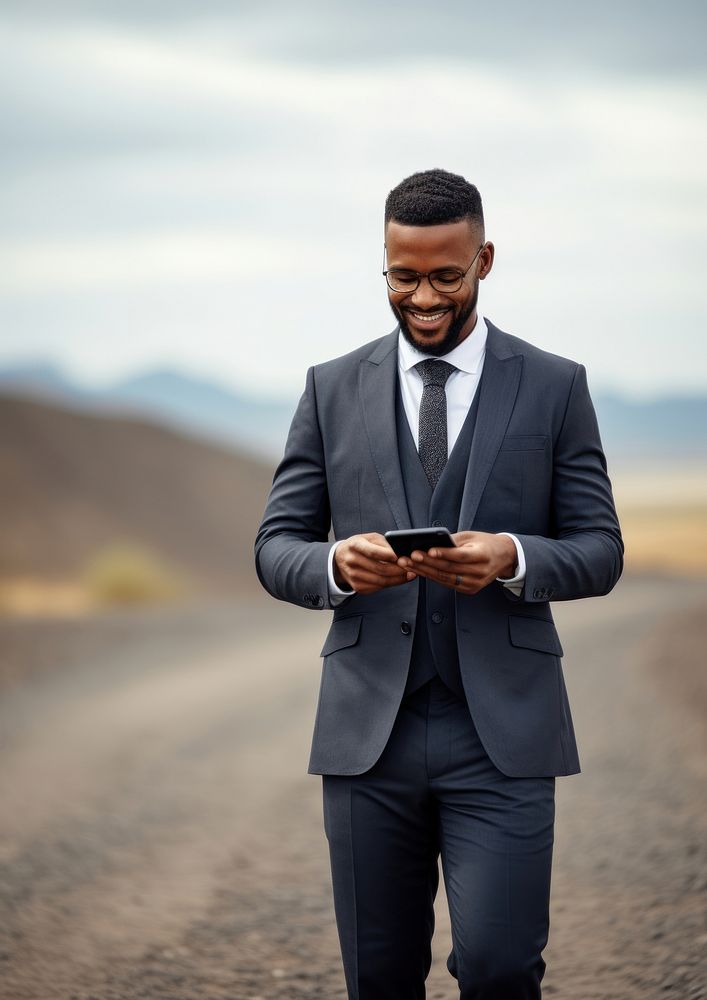 Mature african business people with phone standing portrait adult. AI generated Image by rawpixel.