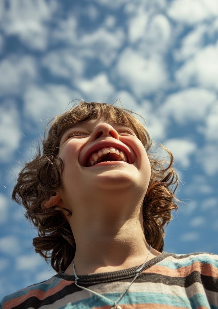Kid having braces laughing portrait outdoors. AI generated Image by rawpixel.