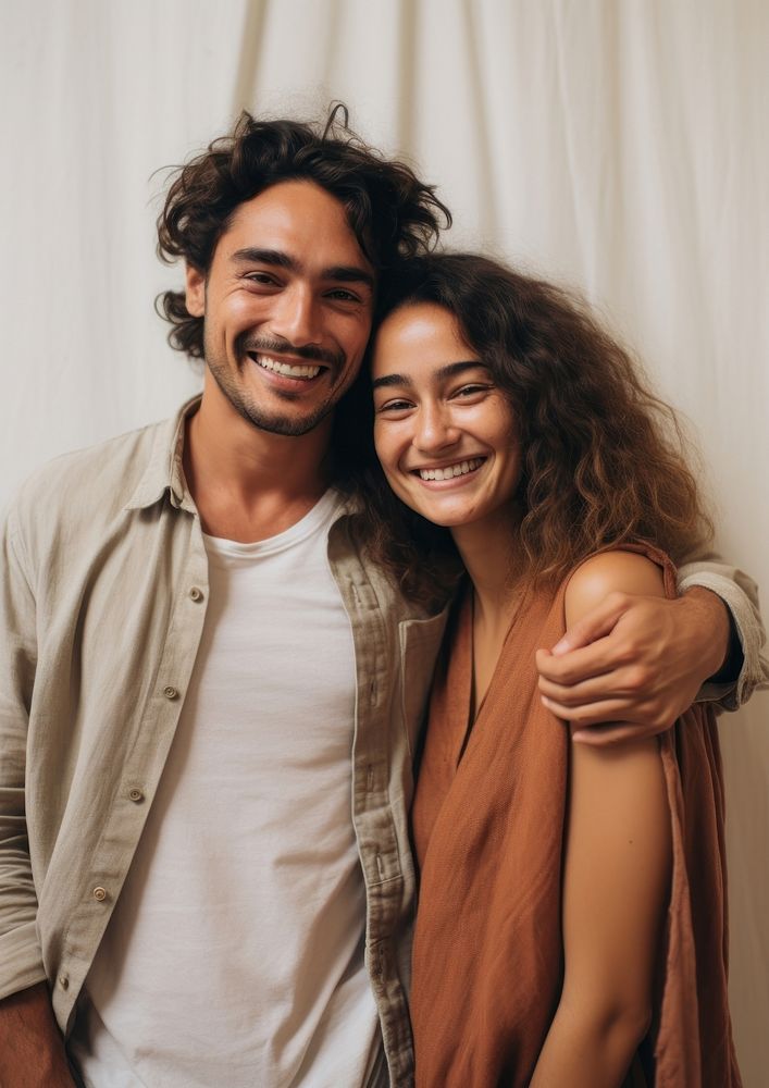 Latin couple laughing standing portrait. AI generated Image by rawpixel.