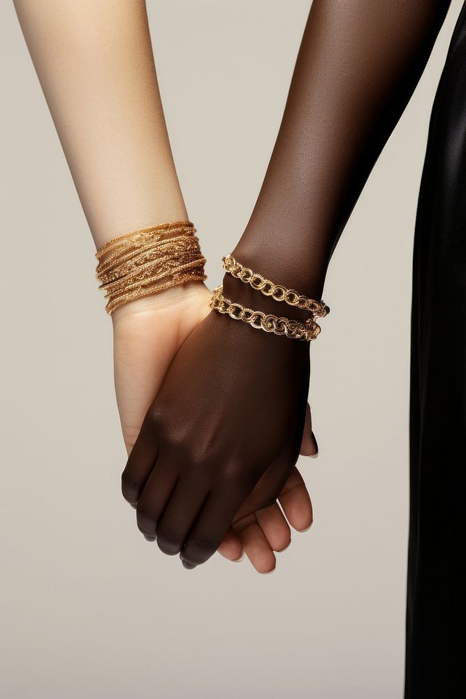 Two female hands holding jewelry accessories bracelet. AI generated Image by rawpixel.