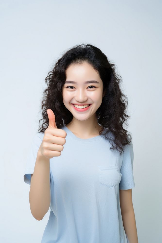 Woman portrait finger smiling. AI generated Image by rawpixel.
