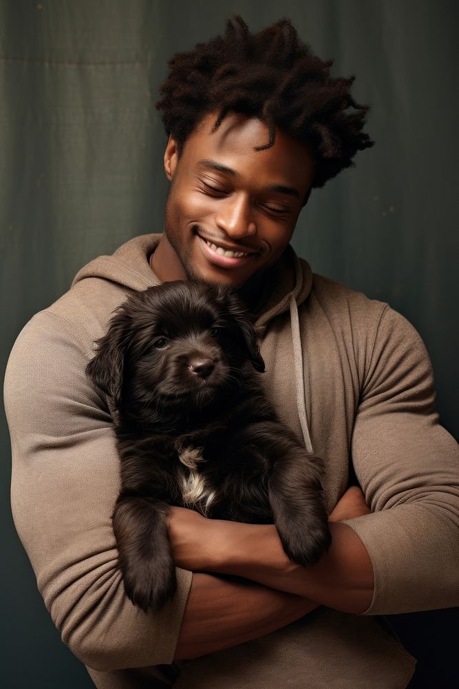 Happy black man hugging cute puppy pet portrait mammal. AI generated Image by rawpixel.