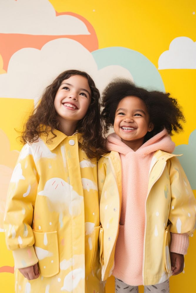 Girl in yellow raincoat laughing portrait cloud. 