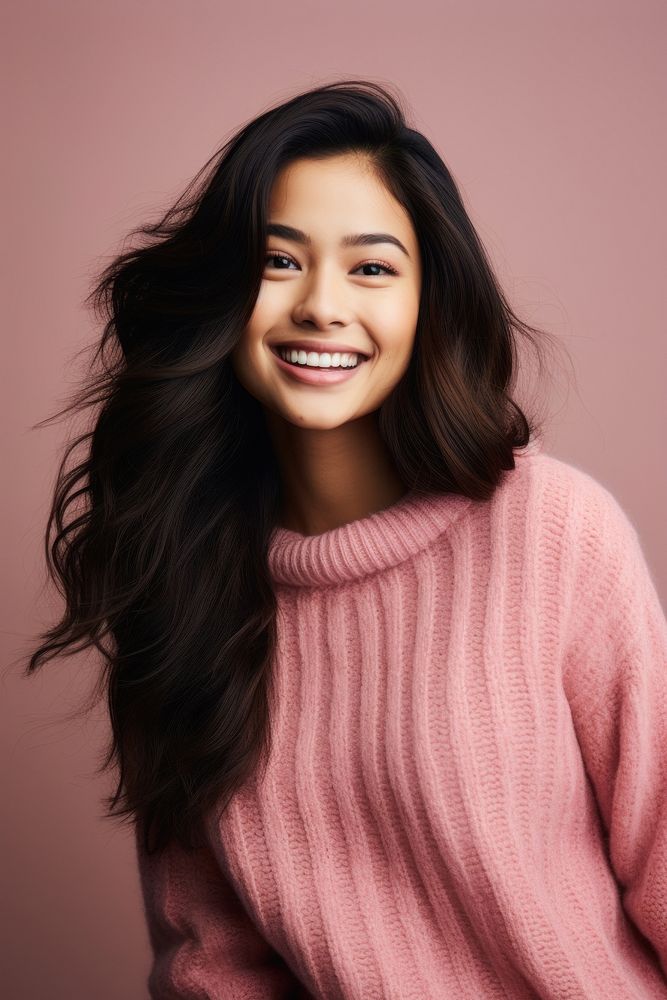 A half american-asian young woman sweater portrait laughing. AI generated Image by rawpixel.