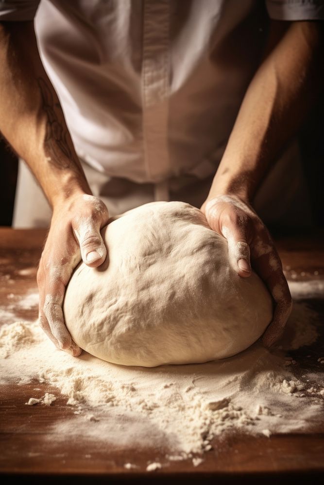 Kneading bread dough cooking kitchen adult. 