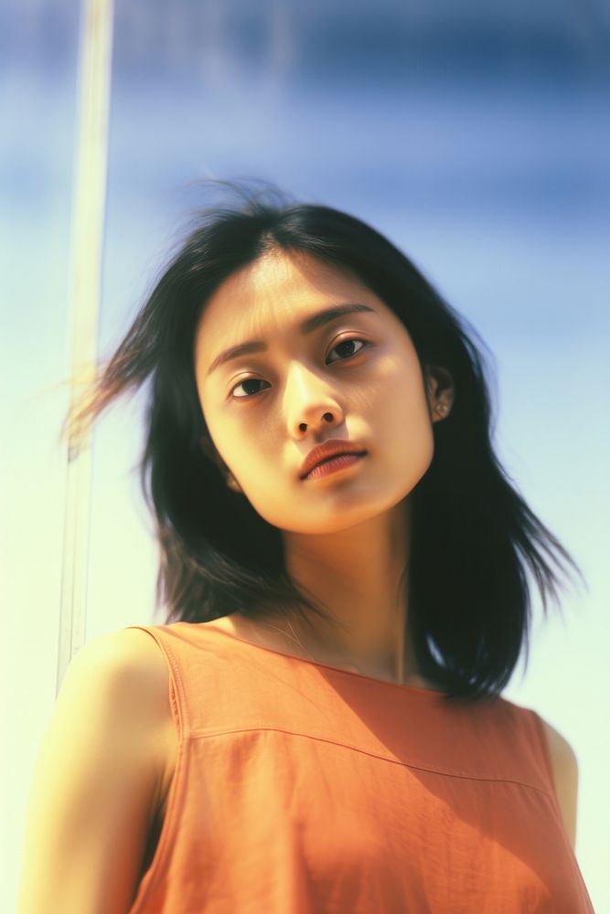 A young asian woman photography portrait adult. AI generated Image by rawpixel.