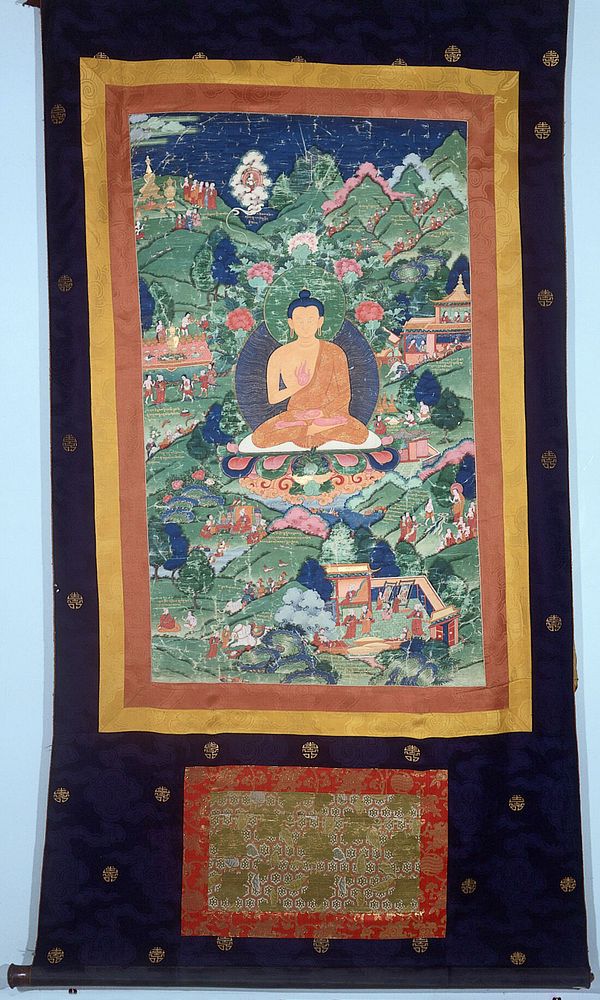 The Buddha Sakyamuni seated on a lotus in a landscape containing scenes of his life and death. Distemper painting by a…