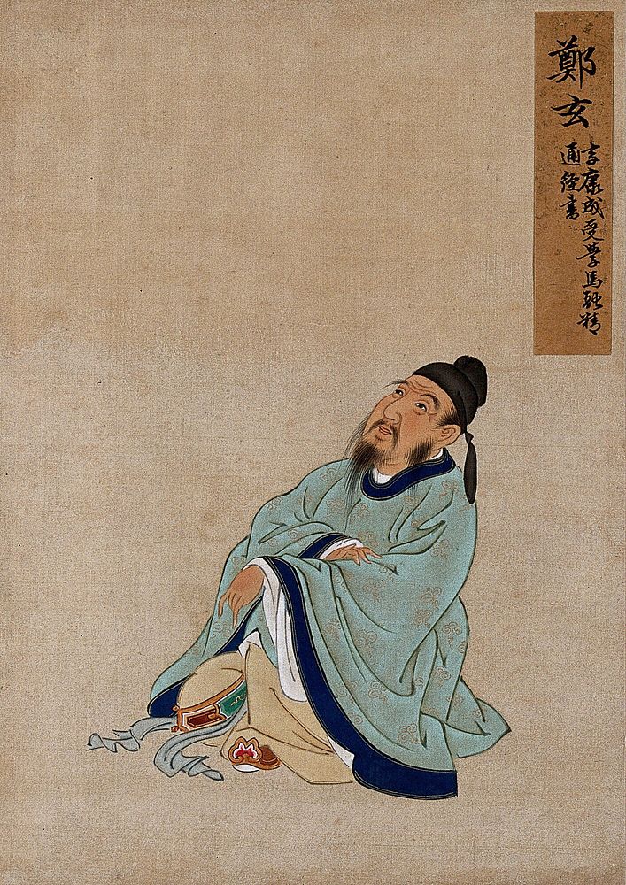 A Chinese figure, seated wearing pale turquoise coloured silk robes with an indigo border and buff undergarments. Painting…