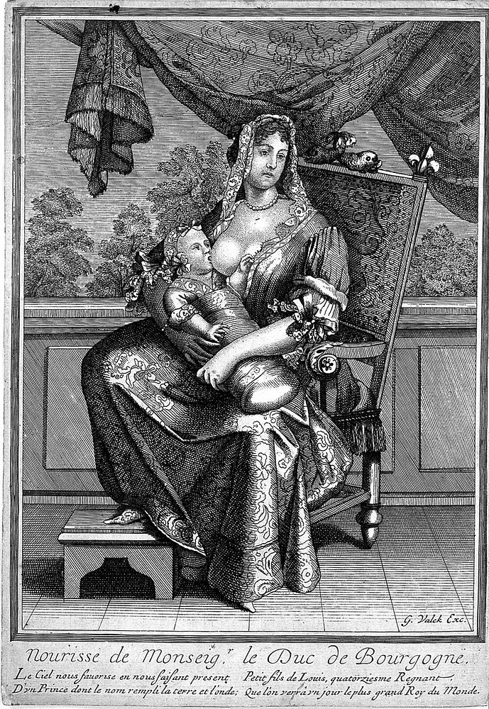 A wet nurse breast feeding the Duke of Burgundy, grandson of Louis XIV. Engraving.