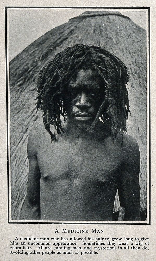 A medicine man or shaman in Africa. Process print, 1910.