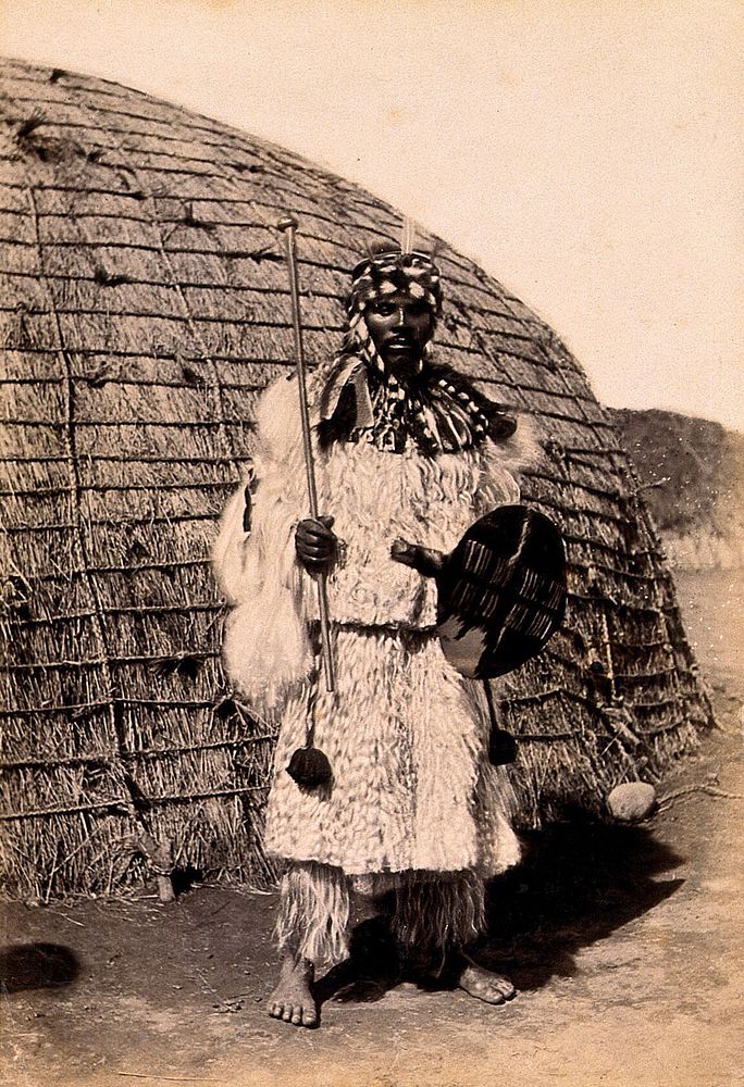 South Africa: an African chief in a dress of angora goatskin. Albumen print.