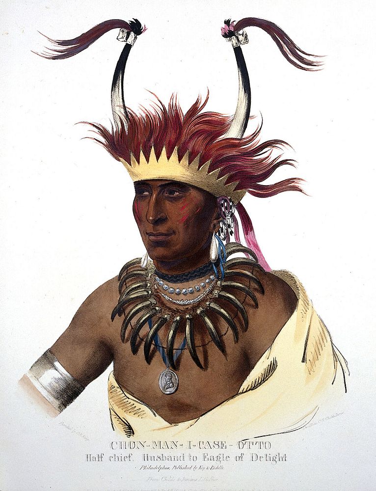 Shaumonekusse, a chief of the Oto (Otoe) tribe, wearing a crown hair piece with horns, a bear-claw necklace and a medallion.…