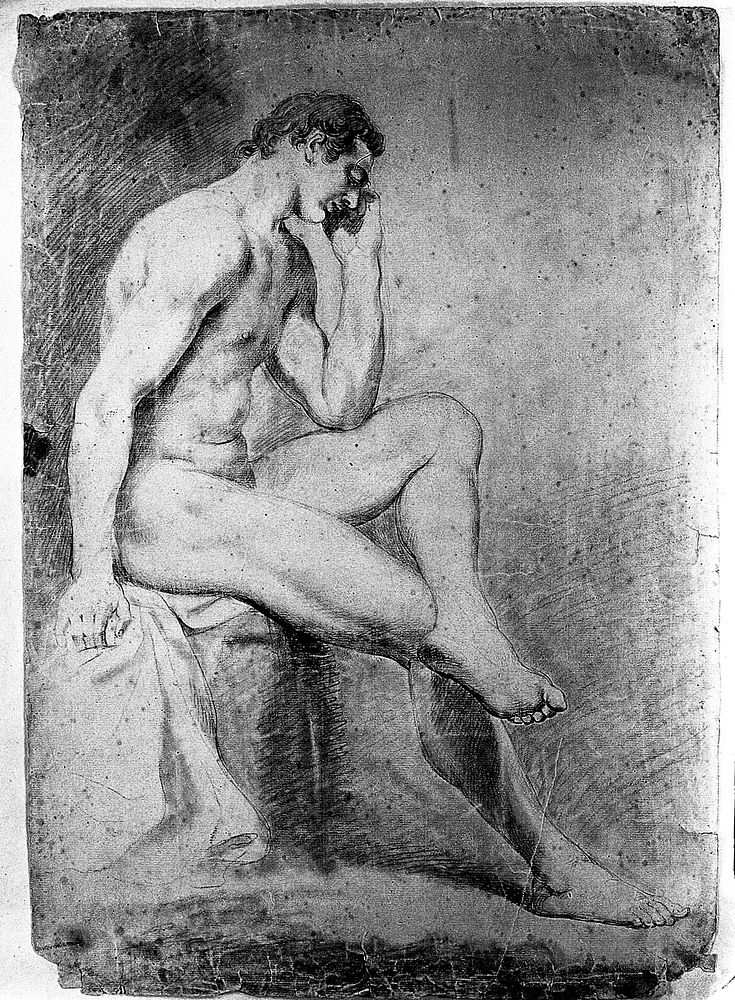 A seated male nude with his left leg crossed over his knee and resting his cheek on his left hand. Black chalk drawing.