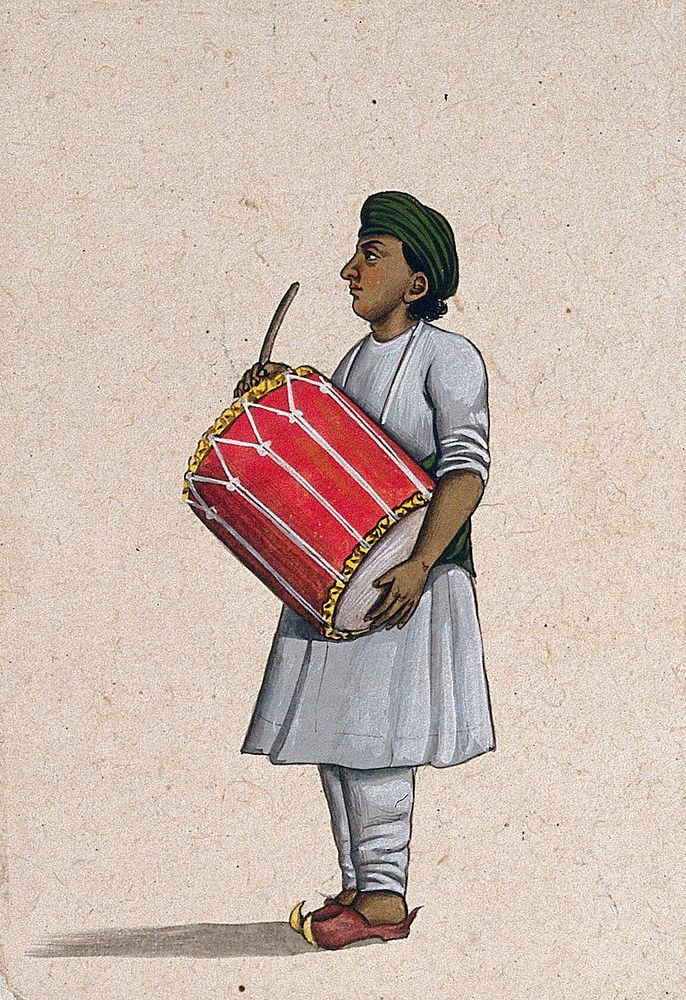 A musician playing a dholka (folk drum). Gouache painting by an Indian artist.