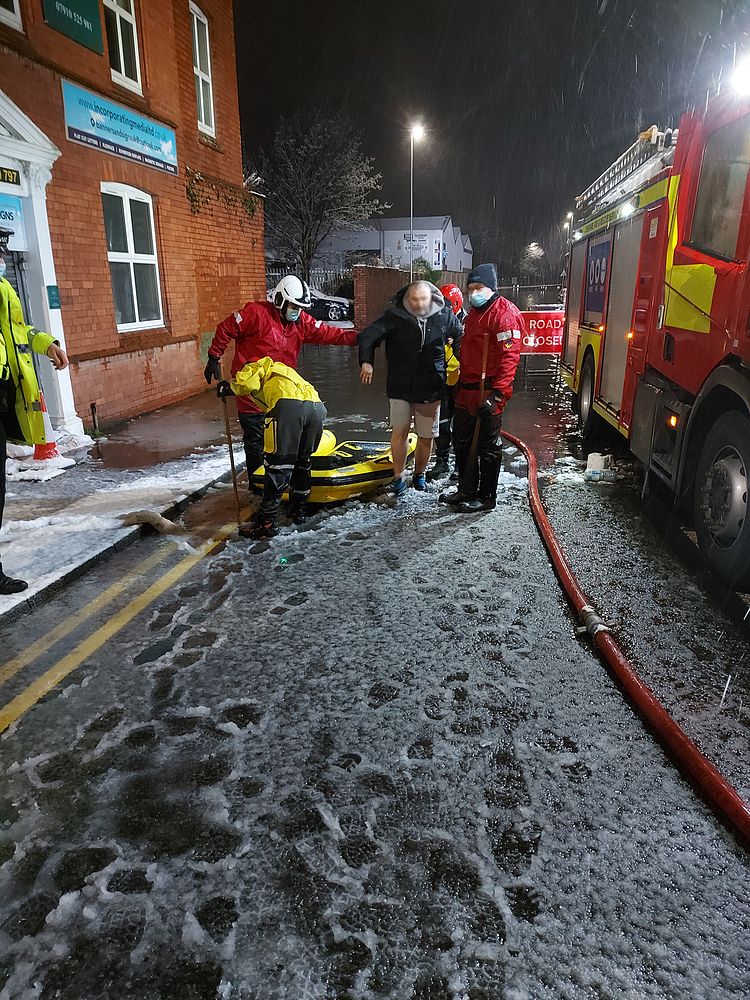Firefighter service in flooded area, January 20, 2021, UK. Original public domain image from Flickr