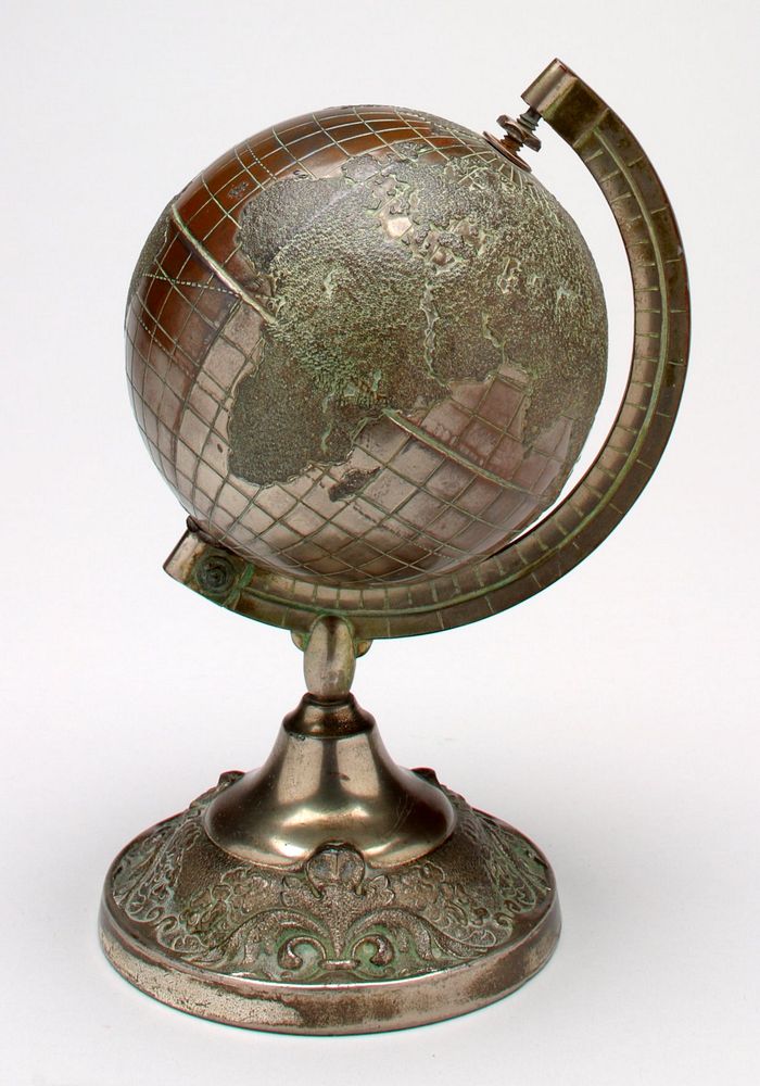 bronze colored globe on pedestal; globe rotates on axis; raised design on pedestal. Original from the Minneapolis Institute…