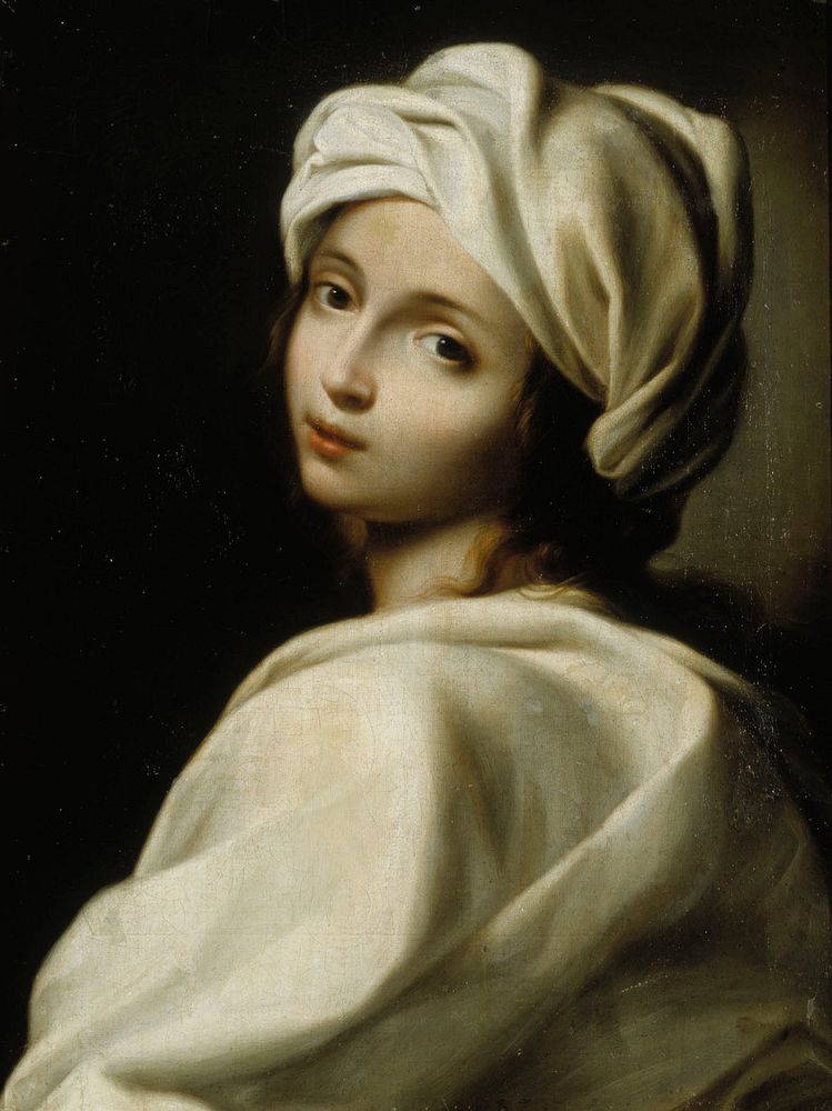 A young woman wearing a turban