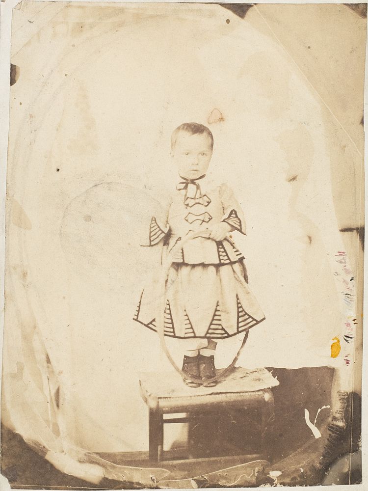 [Child Posed with Hoop]