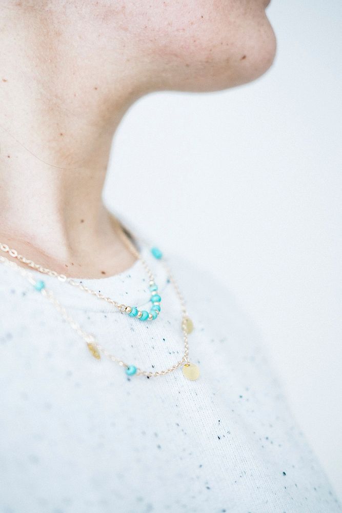 Gold and turquoise double necklace, free public domain CC0 photo.