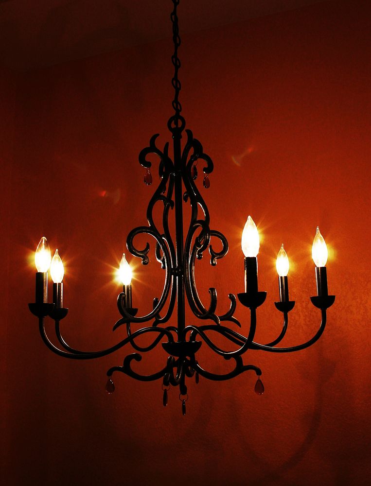Candelabra lamp hanging from ceiling. Free public domain CC0 photo.