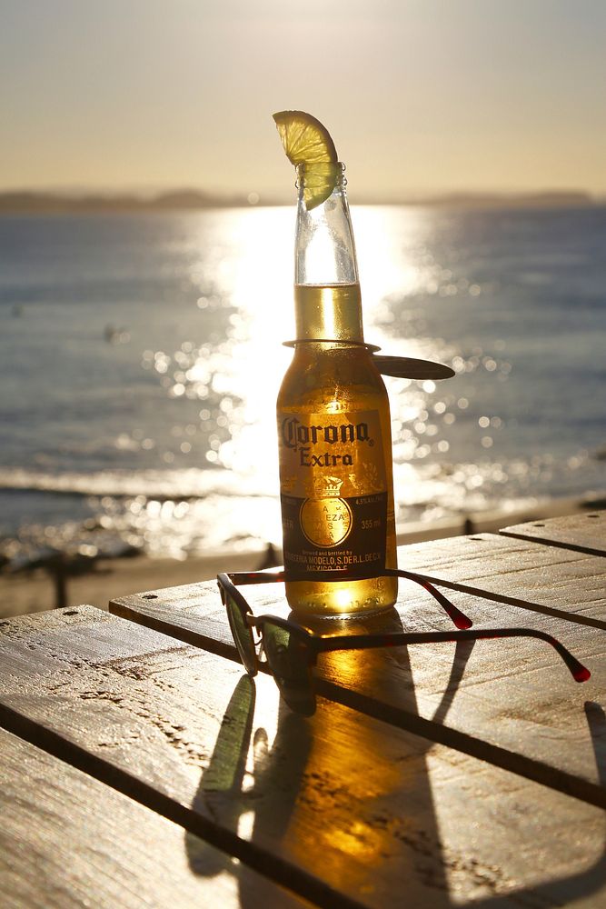 Corona beer bottle by the beach, location unknown, date unknown