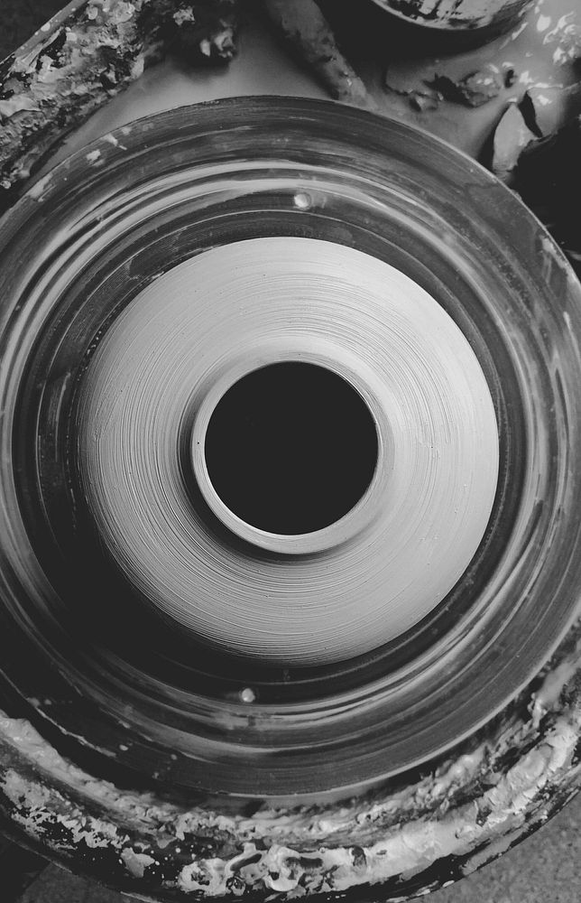 Black and white view of clay on Pottery Wheel. Free public domain CC0 photo.
