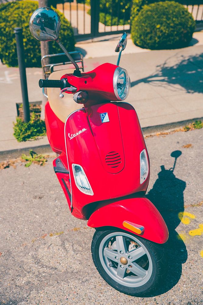 Red scooter, location unknown, date unknown.