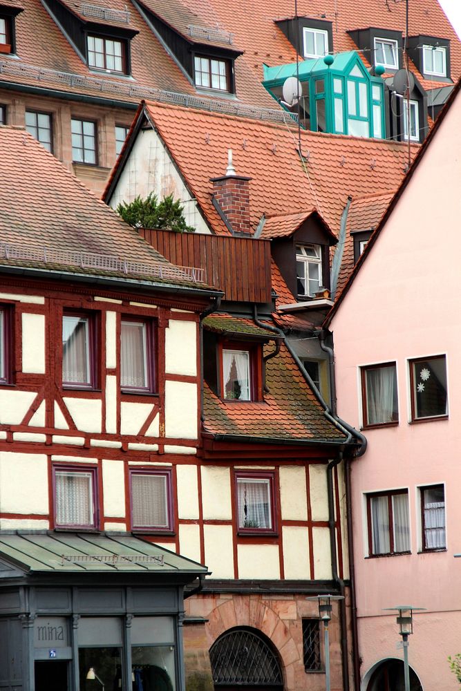 Tall half-timbered houses. Free public domain CC0 image.