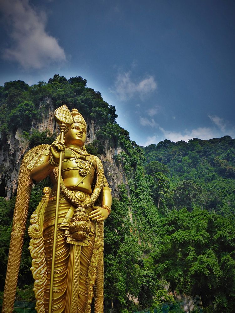 Murugan statue in Batu cave. Free public domain CC0 photo.